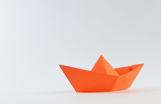 An orange origami boat