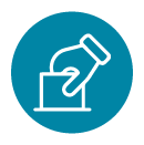 A hand holding a voting ballot card